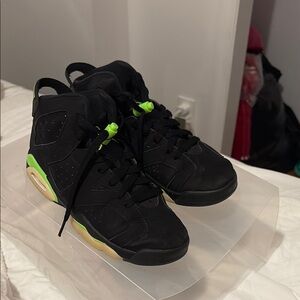 Kids black and green glow in the dark jordan 6s
